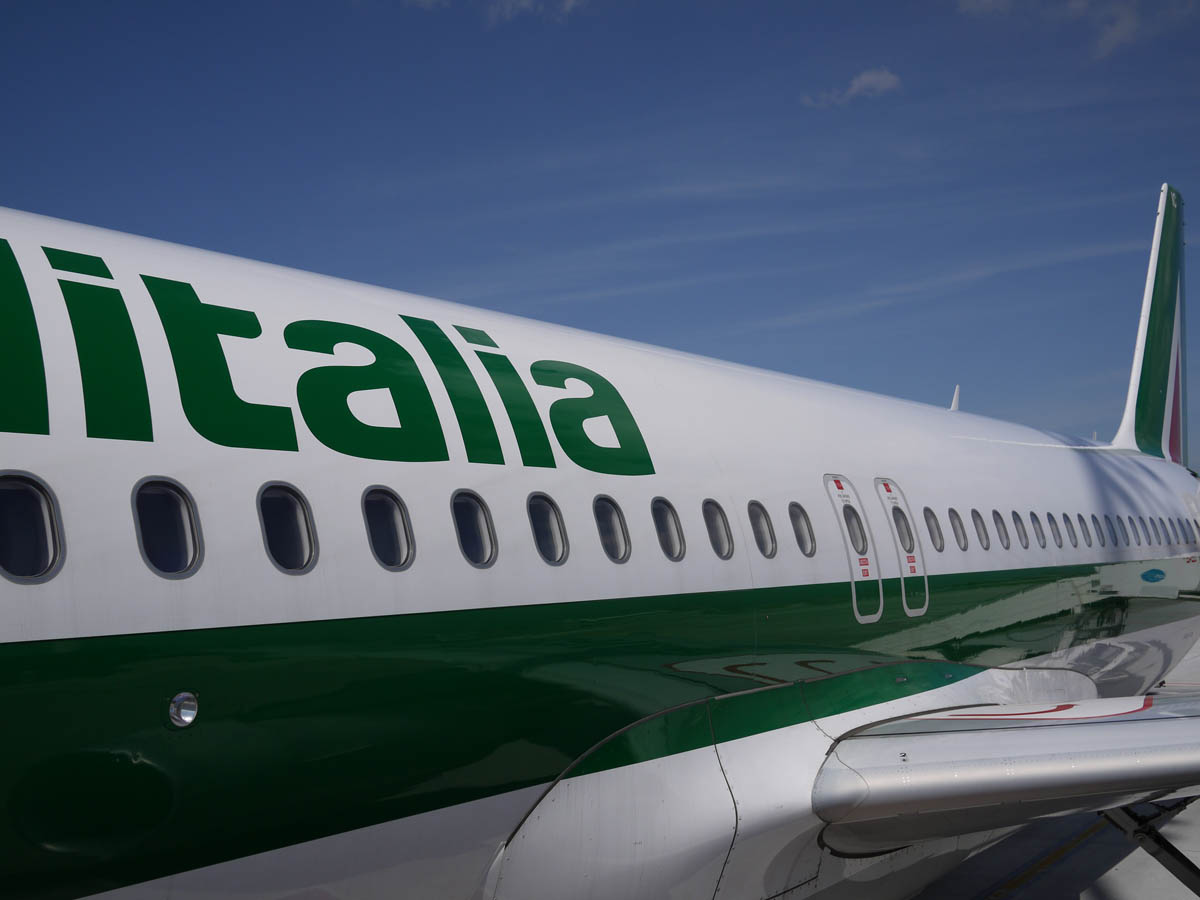Alitalia plane sitting on tarmac