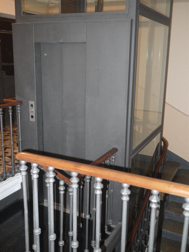 Slow retrofitted elevator in an old building